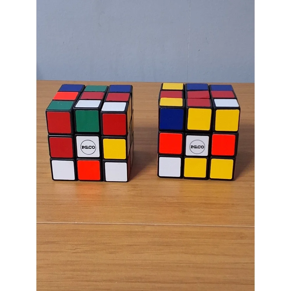 Vintage 1980s Rubik's Cube Set, 2 PG.CO Cubes & A Simple Solution Book. Lot Of 3